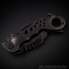 Spring assisted karambit knife